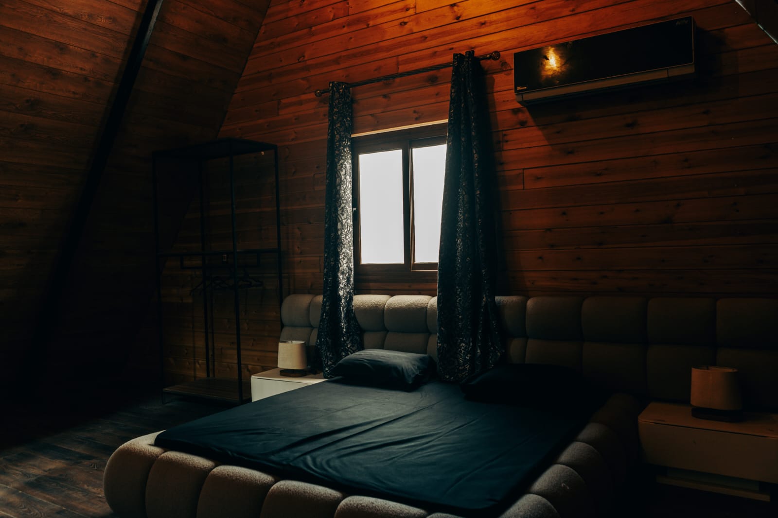 Comfortable loft bedroom with ambient lighting